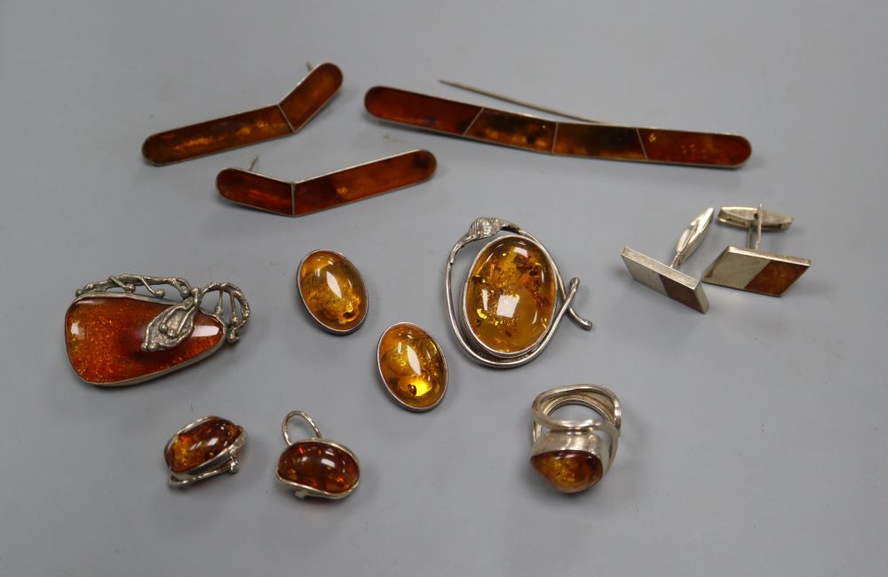 A small group of assorted white metal mounted amber jewellery, including ring, cufflinks, earrings, etc.